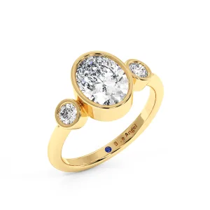 Oval With Round Trilogy Ring - Yellow Gold